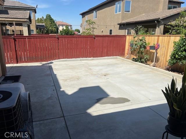 3762 Segovia Dr, Perris, CA 92571 - fenced backyard with a patio area