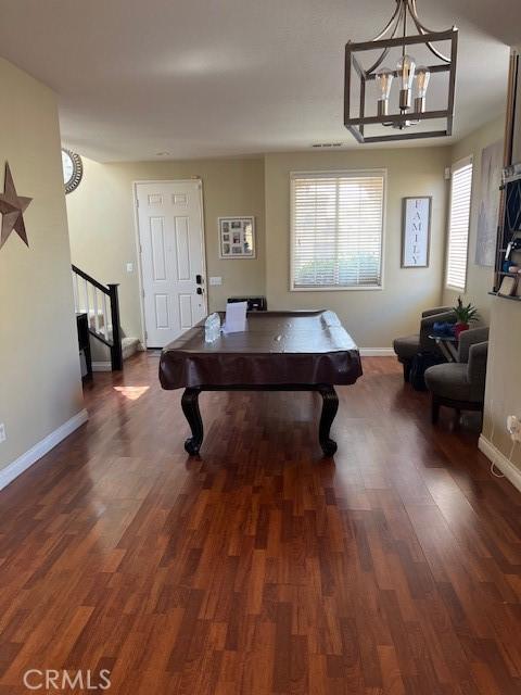 3762 Segovia Dr, Perris, CA 92571 - playroom featuring a chandelier, wood finished floors, baseboards, and pool table