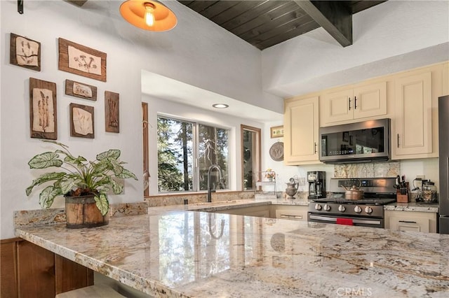 1213 Jungfrau Dr, Crestline, CA 92325 - kitchen featuring appliances with stainless steel finishes, cream cabinetry, light stone countertops, a wooden ceiling with exposed beams, and recessed lighting