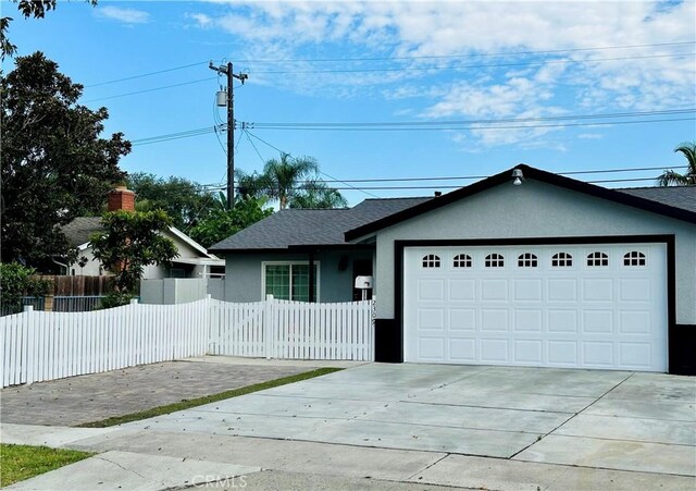 2309 W Anahurst Pl, Santa Ana, CA 92704 - ranch-style house with a garage, stucco siding, concrete driveway, and roof with shingles