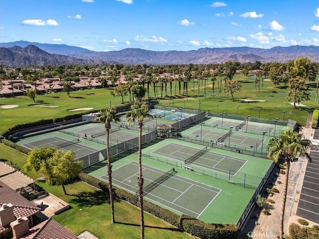 41810 Woodhaven Dr E, Palm Desert, CA 92211 - aerial view of residential area featuring a local golf course and a mountain backdrop