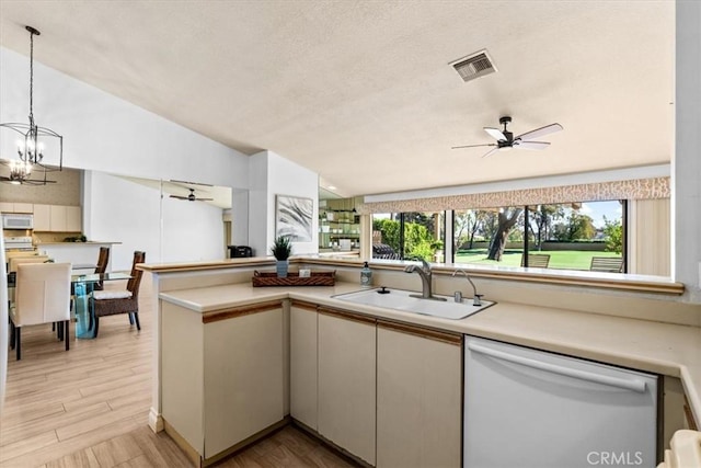 41810 Woodhaven Dr E, Palm Desert, CA 92211 - kitchen featuring white appliances, a sink, ceiling fan, vaulted ceiling, and light countertops
