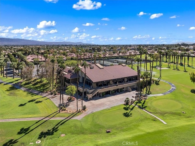 41810 Woodhaven Dr E, Palm Desert, CA 92211 - aerial view of residential area with a local golf course and a mountainous background