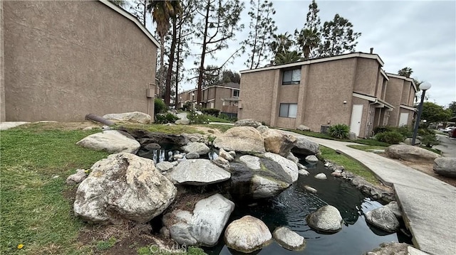 1052 W Ralston St, Ontario, CA 91762 - view of community featuring a small pond
