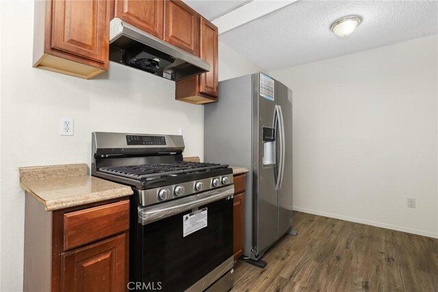 12828 Ramona Blvd Unit 54, Baldwin Park, CA 91706 - kitchen featuring stainless steel appliances, exhaust hood, dark wood-style floors, light countertops, and baseboards