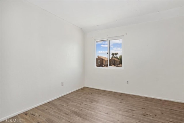 12828 Ramona Blvd Unit 54, Baldwin Park, CA 91706 - unfurnished room with light wood-style floors and baseboards
