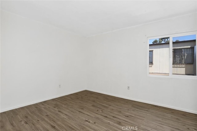 12828 Ramona Blvd Unit 54, Baldwin Park, CA 91706 - unfurnished room featuring wood finished floors and baseboards