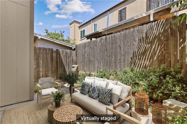 12828 Ramona Blvd Unit 54, Baldwin Park, CA 91706 - view of patio / terrace with an outdoor living space