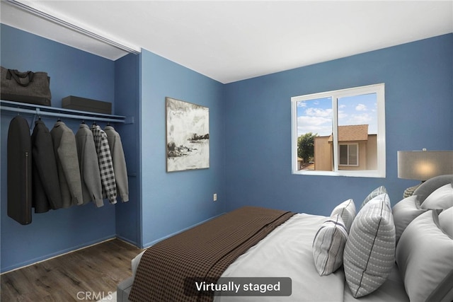 12828 Ramona Blvd Unit 54, Baldwin Park, CA 91706 - bedroom with wood finished floors and baseboards