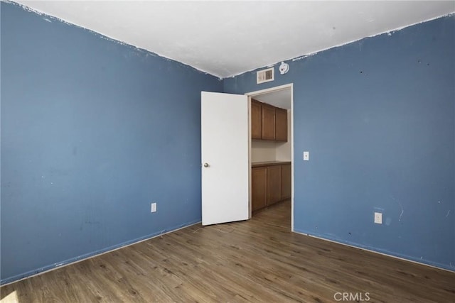 12828 Ramona Blvd Unit 54, Baldwin Park, CA 91706 - spare room with wood finished floors and baseboards