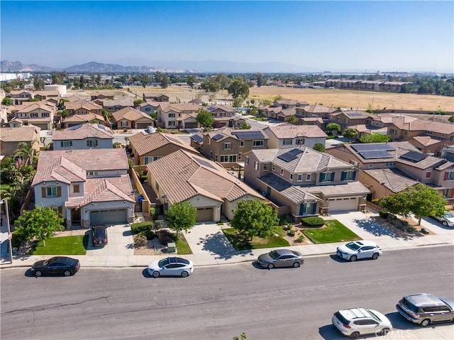 15345 Chive Ln, Fontana, CA 92336 - aerial perspective of suburban area featuring a mountainous background