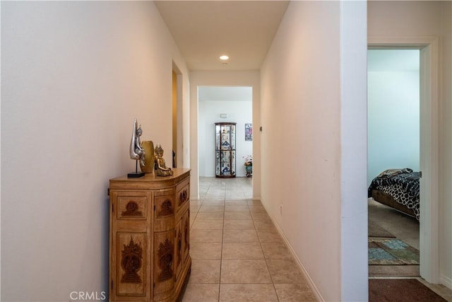 15345 Chive Ln, Fontana, CA 92336 - hall featuring light tile patterned floors and recessed lighting