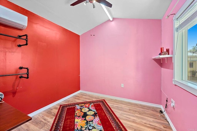 2042 Pheasant Run, Fallbrook, CA 92028 - interior space with a wall unit AC, ceiling fan, and wood finished floors
