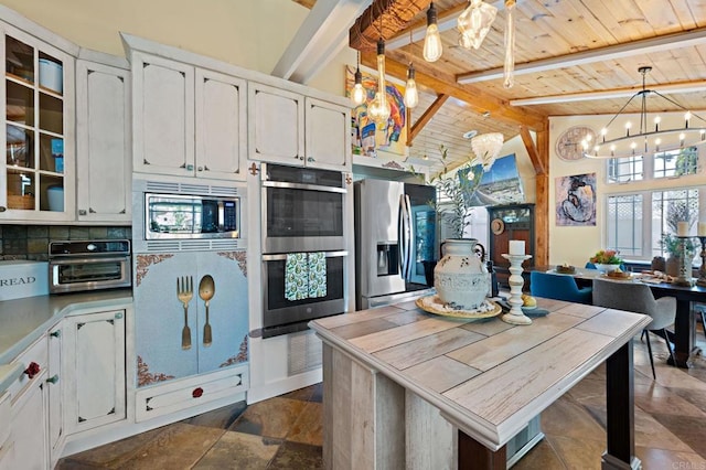 2042 Pheasant Run, Fallbrook, CA 92028 - kitchen with appliances with stainless steel finishes, a chandelier, a wood ceiling with exposed beams, white cabinets, and glass insert cabinets