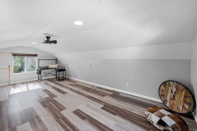 2042 Pheasant Run, Fallbrook, CA 92028 - additional living space featuring vaulted ceiling, wood finished floors, a ceiling fan, and a textured ceiling