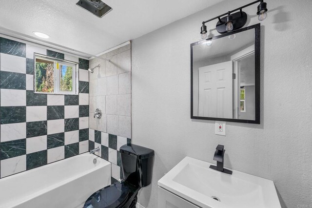 2042 Pheasant Run, Fallbrook, CA 92028 - bathroom with shower / tub combination, vanity, and a textured wall
