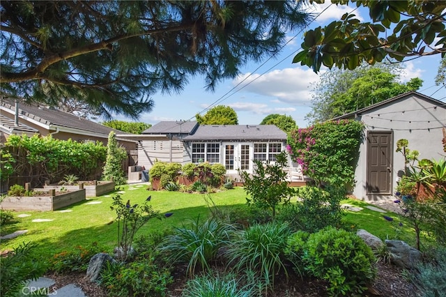 4146 Michael Ave, Los Angeles, CA 90066 - view of green lawn featuring a garden and french doors