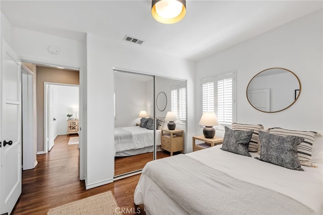 4146 Michael Ave, Los Angeles, CA 90066 - bedroom with dark wood-type flooring, a closet, and baseboards