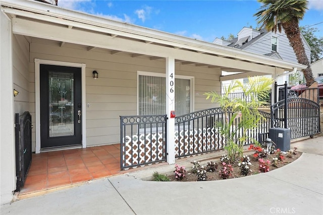 406 E Graves Ave, Monterey Park, CA 91755 - property entrance with covered porch and a gate