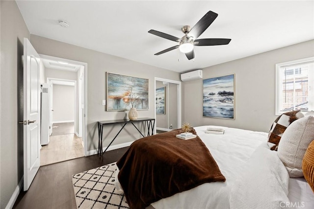 406 E Graves Ave, Monterey Park, CA 91755 - bedroom with a wall mounted air conditioner, dark wood-type flooring, baseboards, and a ceiling fan