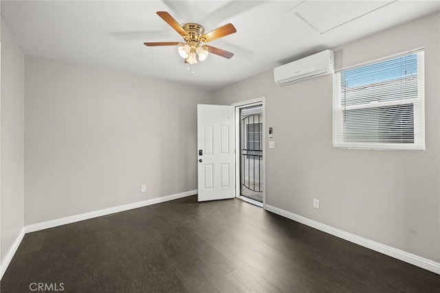 406 E Graves Ave, Monterey Park, CA 91755 - spare room featuring a wall mounted AC, attic access, dark wood-style floors, and baseboards