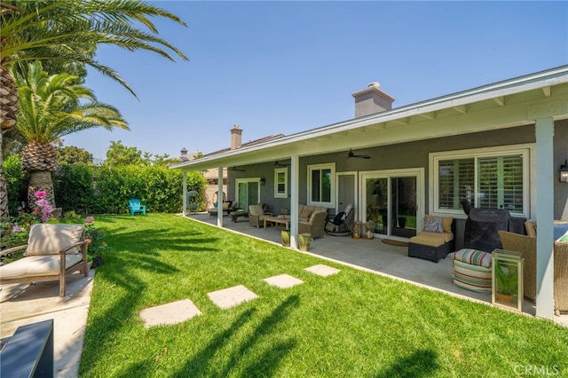 7256 Plumrose St, Fontana, CA 92336 - view of grassy yard featuring an outdoor living space, ceiling fan, and a patio