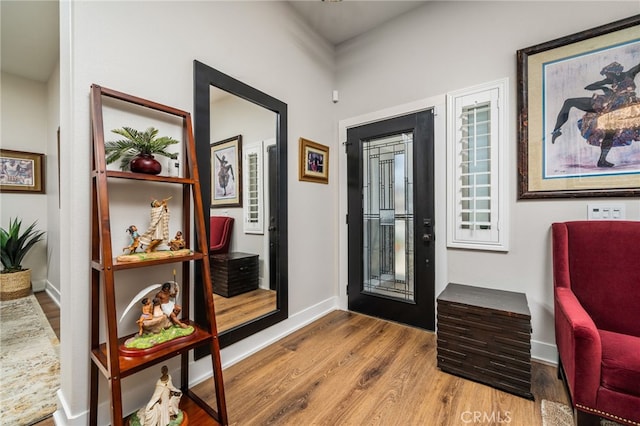 7256 Plumrose St, Fontana, CA 92336 - foyer featuring wood finished floors and baseboards