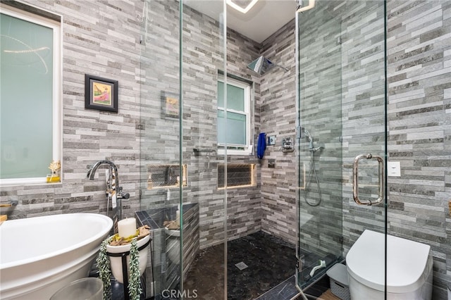 7256 Plumrose St, Fontana, CA 92336 - bathroom with tile walls, a shower stall, and toilet