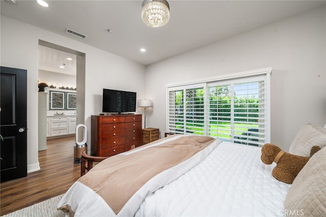 7256 Plumrose St, Fontana, CA 92336 - bedroom featuring wood finished floors, recessed lighting, and a sink