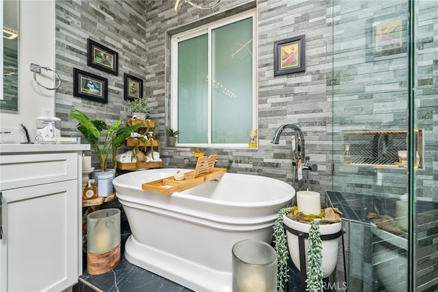 7256 Plumrose St, Fontana, CA 92336 - full bath featuring vanity, a freestanding tub, a stall shower, and marble finish flooring