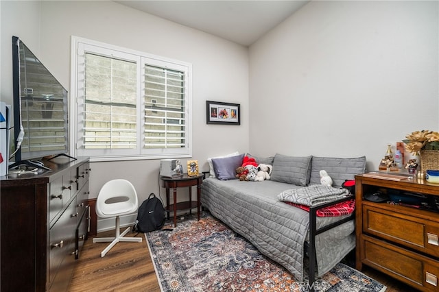 7256 Plumrose St, Fontana, CA 92336 - bedroom with dark wood-style floors and baseboards