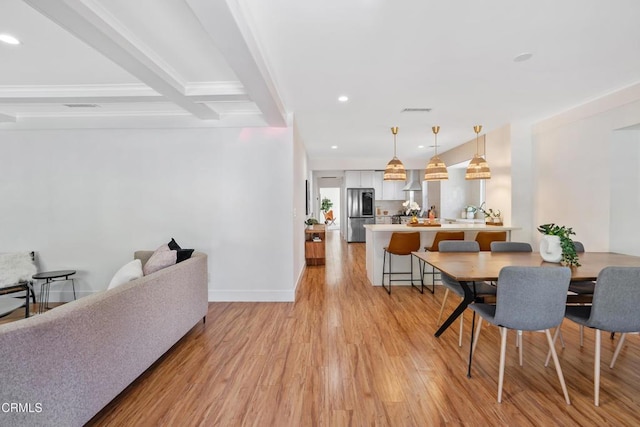 1015 Nolden St, Highland Park, CA 90042 - dining room with light wood finished floors, recessed lighting, beamed ceiling, and crown molding