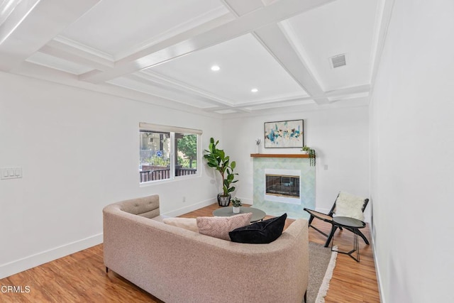 1015 Nolden St, Highland Park, CA 90042 - living room featuring coffered ceiling, beamed ceiling, light wood finished floors, recessed lighting, and a fireplace