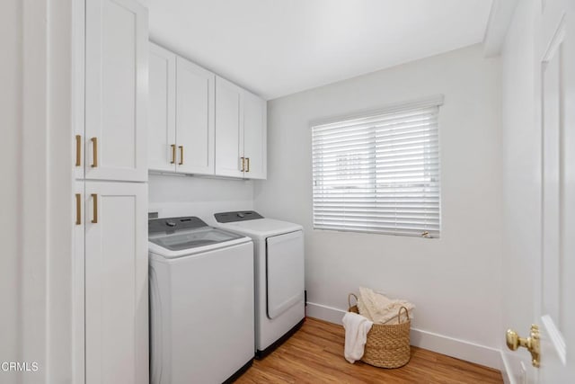 1015 Nolden St, Highland Park, CA 90042 - washroom with washing machine and clothes dryer, cabinet space, and light wood finished floors