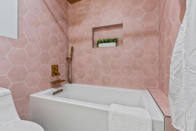 1015 Nolden St, Highland Park, CA 90042 - full bath with curtained shower, tile walls, and a tub to relax in