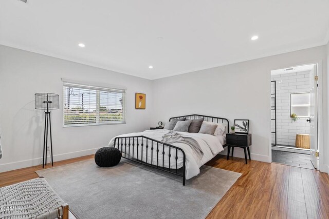 1015 Nolden St, Highland Park, CA 90042 - bedroom featuring wood finished floors, recessed lighting, and connected bathroom
