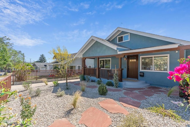 1015 Nolden St, Highland Park, CA 90042 - view of front facade featuring stucco siding and covered porch