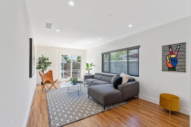 1015 Nolden St, Highland Park, CA 90042 - living area featuring light wood-style flooring and recessed lighting