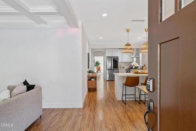 1015 Nolden St, Highland Park, CA 90042 - entrance foyer featuring light wood-style flooring, recessed lighting, and beamed ceiling