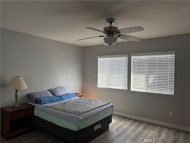 861 Moyano Cir, Corona, CA 92882 - bedroom featuring wood finished floors, baseboards, and ceiling fan