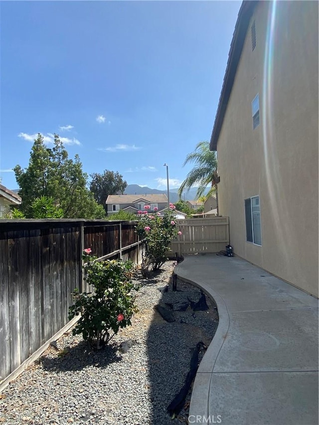 861 Moyano Cir, Corona, CA 92882 - fenced backyard with a patio area