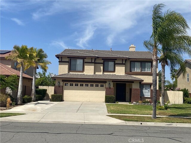 861 Moyano Cir, Corona, CA 92882 - view of front facade with concrete driveway, a garage, stucco siding, brick siding, and a chimney