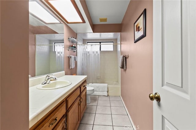 1555 Cordova Dr, San Luis Obispo, CA 93405 - full bath with vanity, toilet, tile patterned floors, shower / bath combo with shower curtain, and baseboards