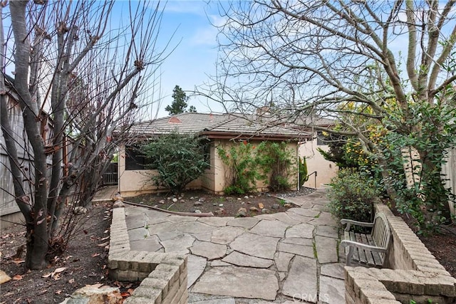 1555 Cordova Dr, San Luis Obispo, CA 93405 - fenced backyard with an outbuilding and a patio