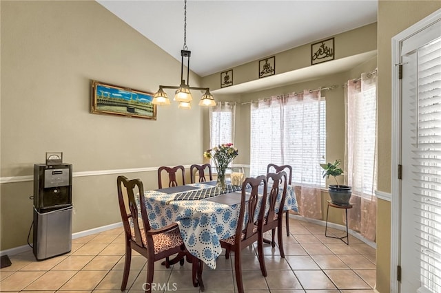 10033 N Baird Ave, Fresno, CA 93730 - dining room with light tile patterned floors and vaulted ceiling