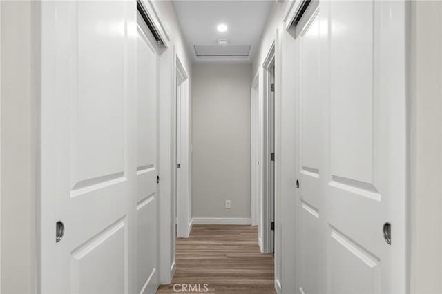 5821 Copeland Rd, Paradise, CA 95969 - hallway featuring wood finished floors and attic access