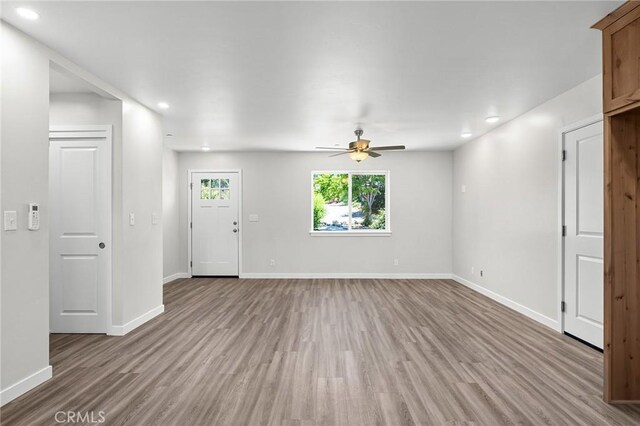 5821 Copeland Rd, Paradise, CA 95969 - unfurnished living room with light wood-type flooring, recessed lighting, ceiling fan, and baseboards