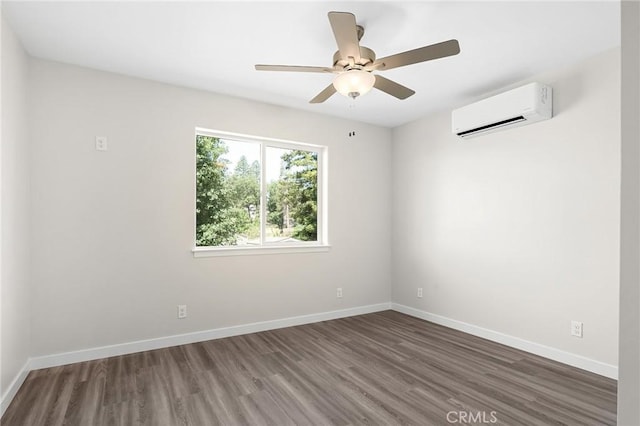 5821 Copeland Rd, Paradise, CA 95969 - unfurnished room featuring an AC wall unit, wood finished floors, and a ceiling fan