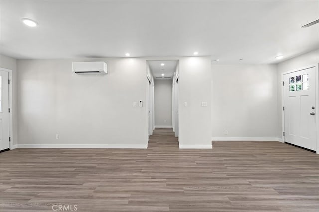 5821 Copeland Rd, Paradise, CA 95969 - entryway featuring an AC wall unit, recessed lighting, wood finished floors, and baseboards