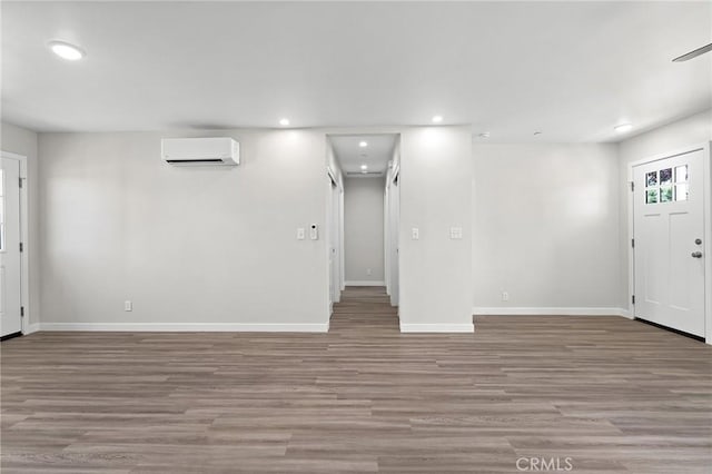 5821 Copeland Rd, Paradise, CA 95969 - foyer entrance featuring an AC wall unit, recessed lighting, and wood finished floors